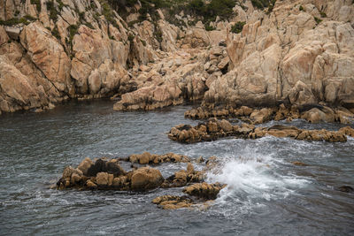 Scenic view of rocks in sea