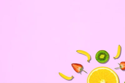 Close-up of fruit over white background