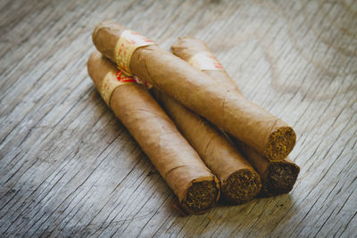 High angle view of cigars on table
