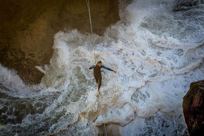 Man surfing in sea