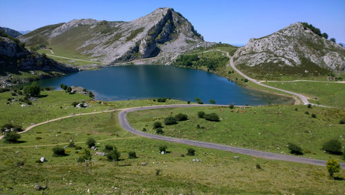 Scenic view of landscape and mountains against sky