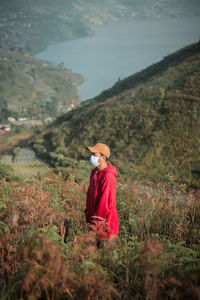 Full length of woman standing on land