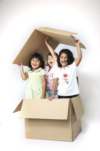 Portrait of smiling girl in box