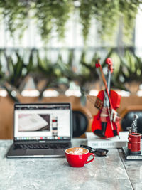 Close-up of coffee cup on table