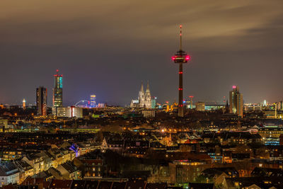 Cologne cityscape at night, germany. view of cologne cathedral and colonius tv tower.