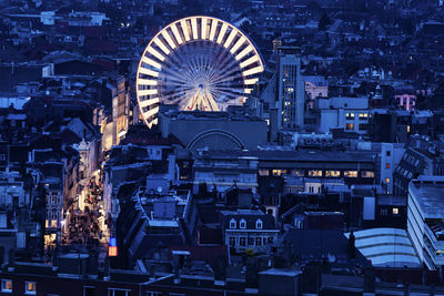 High angle view of illuminated cityscape