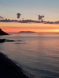 Scenic view of sea against sky during sunset