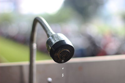 Close-up of faucet outdoors