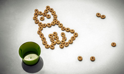 High angle view of buttons on table