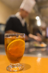 Close-up of beer glass on table