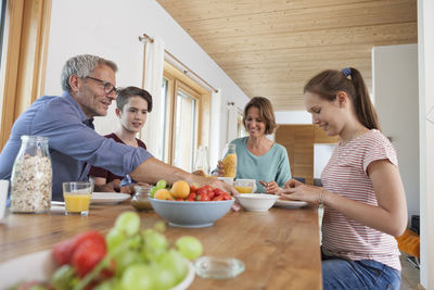 Family having breakfast at home