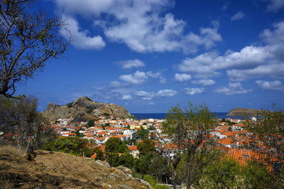 View of townscape against blue sky