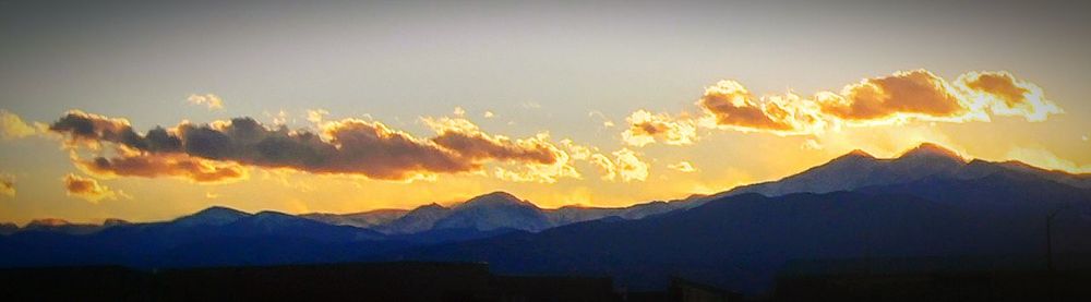 Scenic view of mountains at sunset