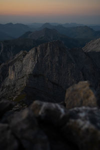 Scenic view of mountains against sky during sunset