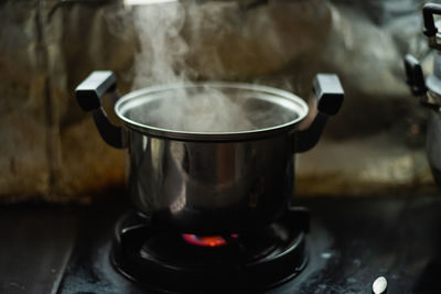 Close-up of tea cup in kitchen at home