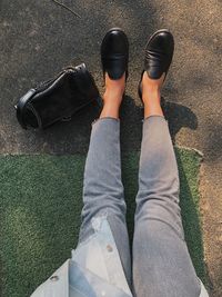 Low section of woman standing on floor