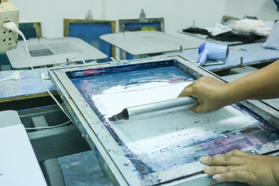 Close-up of person working on table