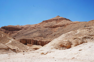 Rock formations in desert against clear sky