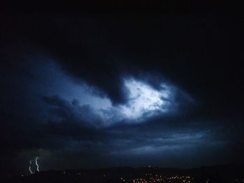 Scenic view of illuminated sky at night