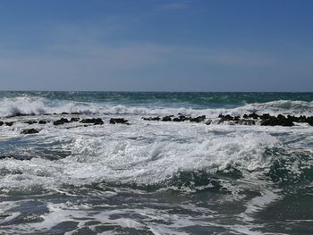 Scenic view of sea against clear sky