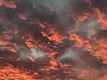 Low angle view of clouds in sky during sunset