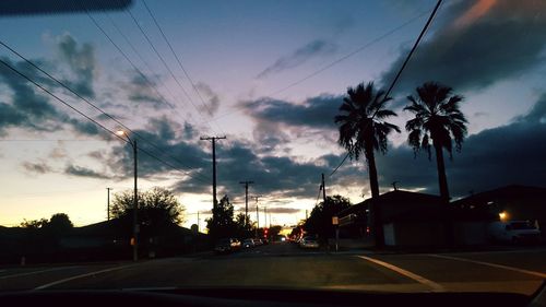 Road against sky at sunset