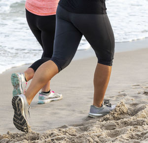Low section of woman on beach