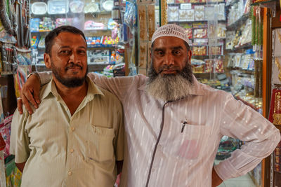 Portrait of man standing in store