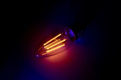 Close-up of illuminated electric lamp