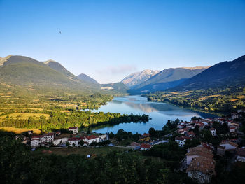 Panoramic view of lake and mountains against sky