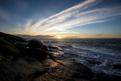 Scenic view of sea against sky during sunset