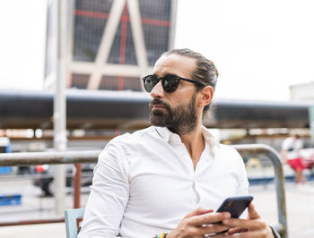 Young man using mobile phone