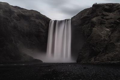 Idyllic view of skogafoss against sky