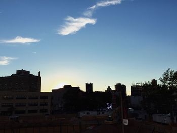 View of buildings against sky at sunset