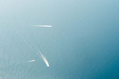 Airplane flying over sea