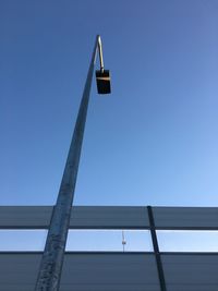 Low angle view of built structure against blue sky