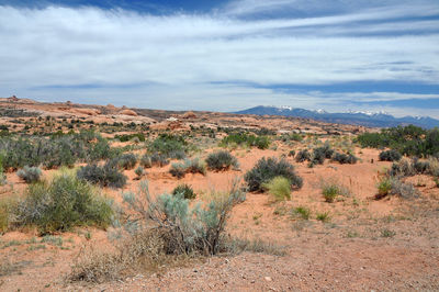 Countryside landscape against clouds