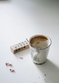 Close-up of coffee cup on white background