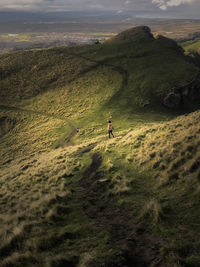 People hiking at te mata peak in north island of new zealand