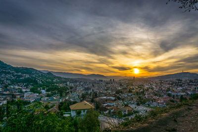 High angle view of townscape against sky during sunset