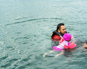 High angle view of woman in sea