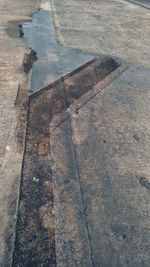 High angle view of puddle on wet street