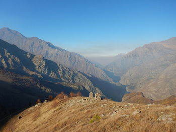 Scenic view of mountains against clear sky