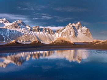 Scenic view of snowcapped mountain against sky