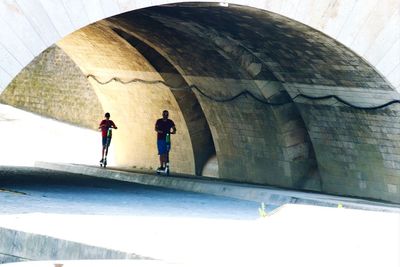 People walking on wall