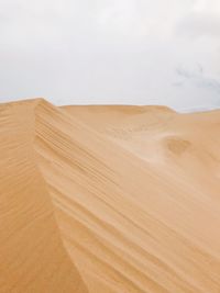 Scenic view of desert against sky