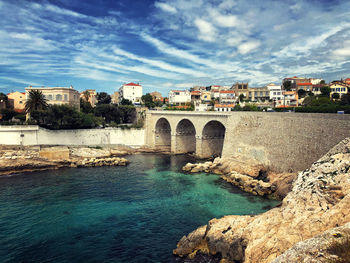 Arch bridge over river