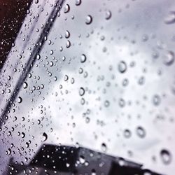 Close-up of water drops on glass