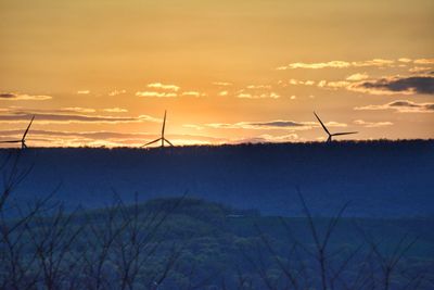 Scenic view of silhouette landscape against sky during sunset