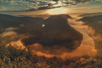 Saar loop in the fog at sunrise, germany.